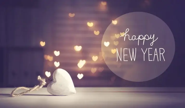 Heart lights with text that says Happy New Year
